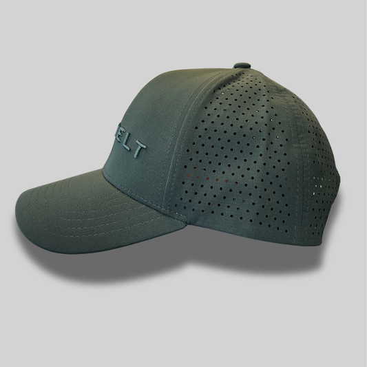 Green Rozvelt cap with perforated design on a grey background