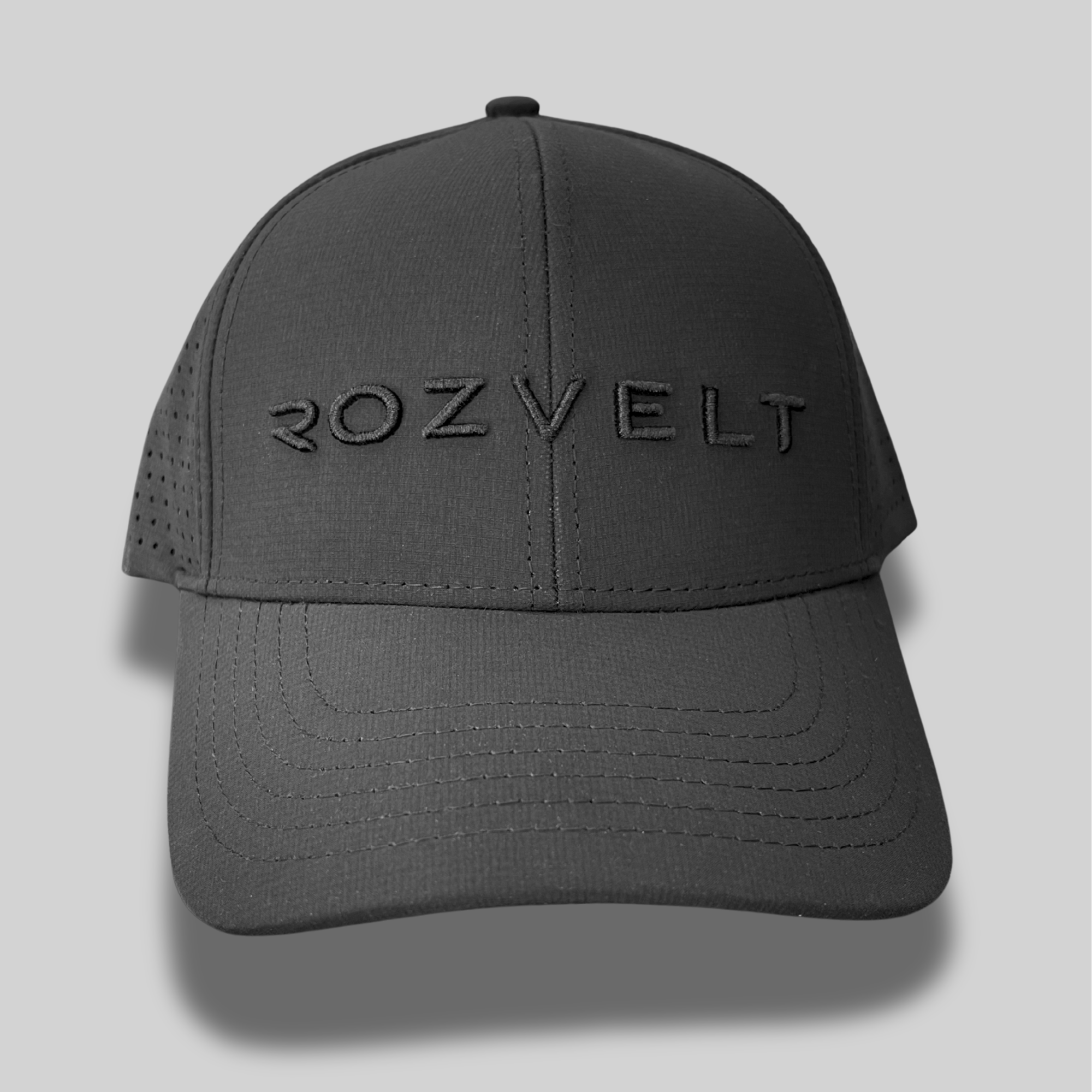 Black cap with 'ROZVELT' branding on a gray background